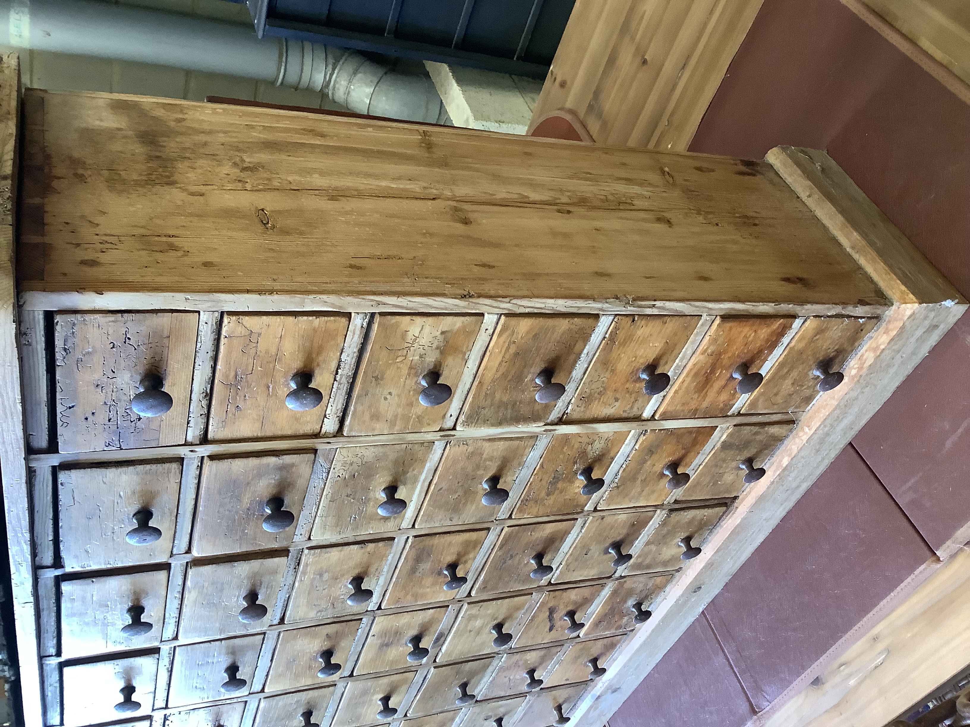 A Victorian apothecaries bank of 70 small drawers